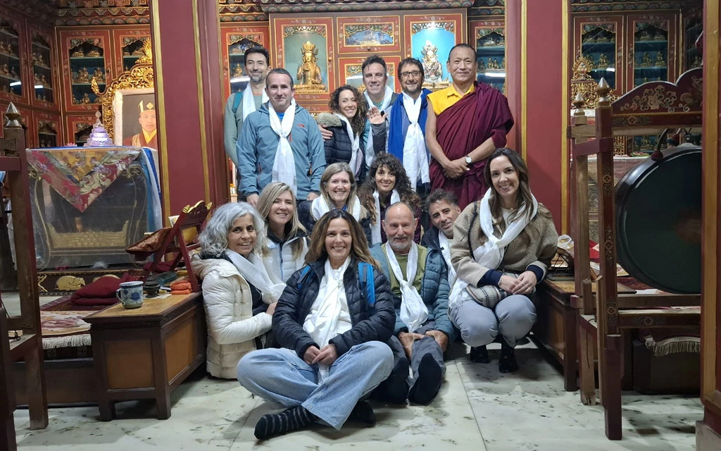 Yoga group for Annapurna Base Camp posing at a monastery