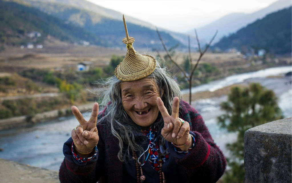 A Bhutanese Lade Posing for photo