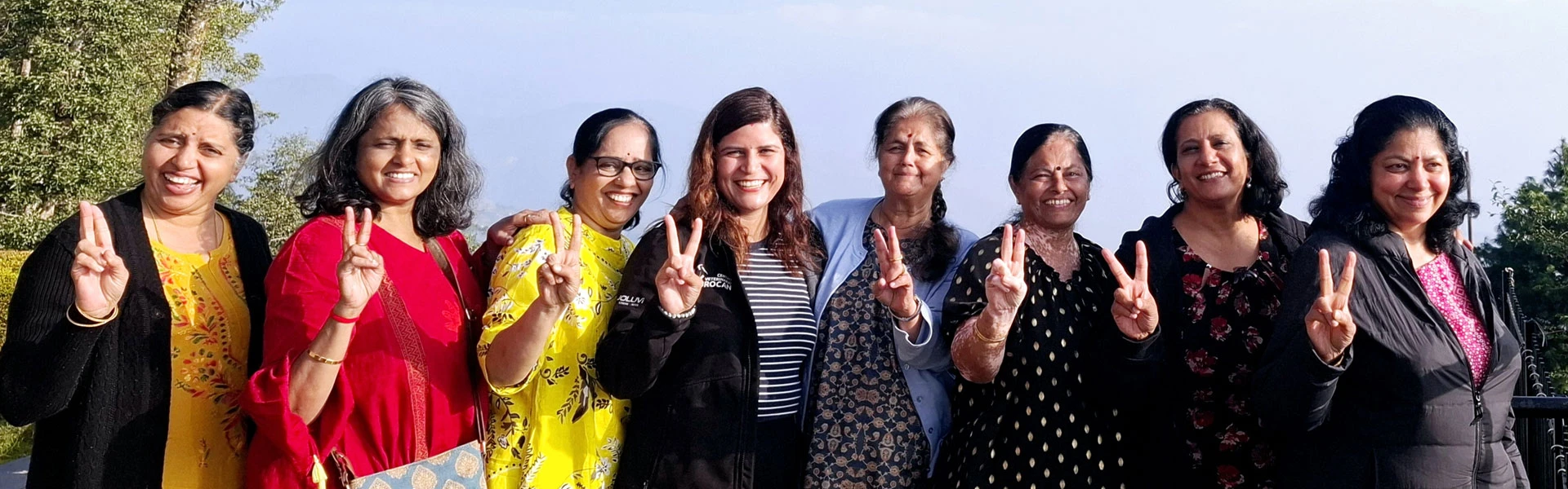 Female Tour Guide in Nepal with Guests at Nagarkot